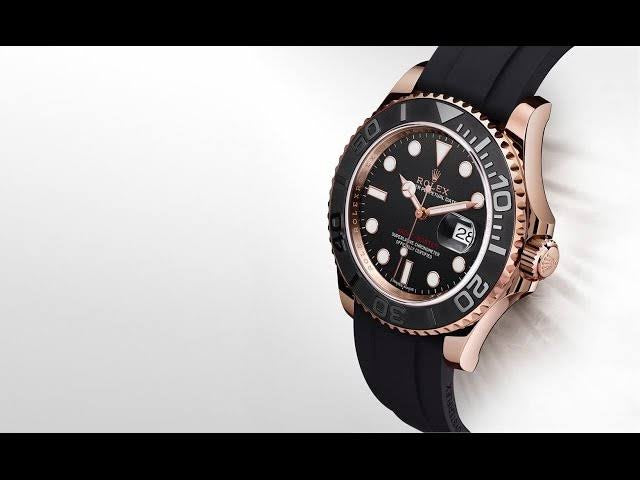 Rolex Sea-Dweller, typically featuring a gold-toned case and a rubber strap With box