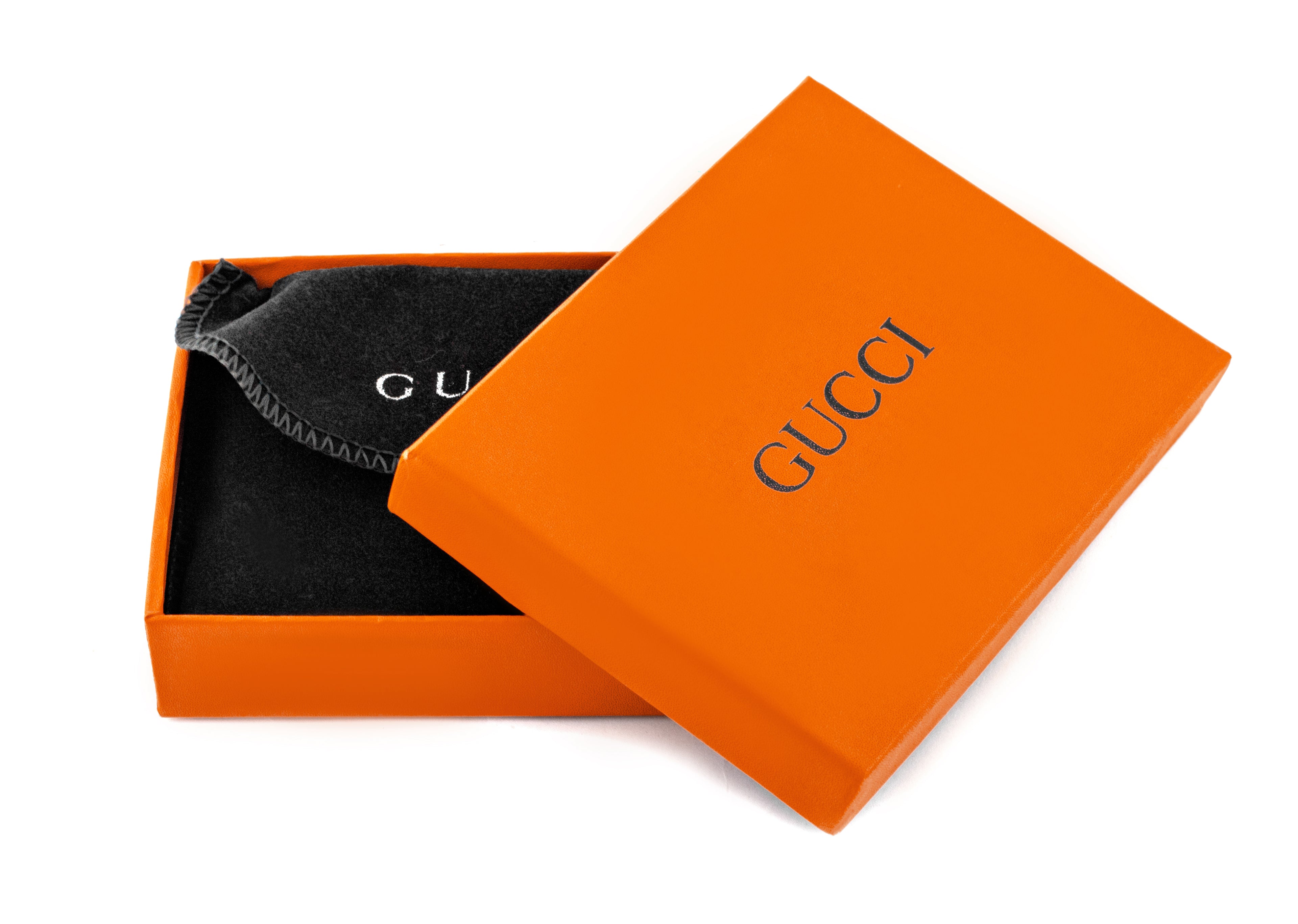 GUCCI features a premium snake-pattern leather design in rich brown