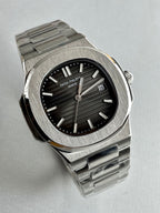 Patek Philippe Nautilus, specifically a stainless steel black with box men